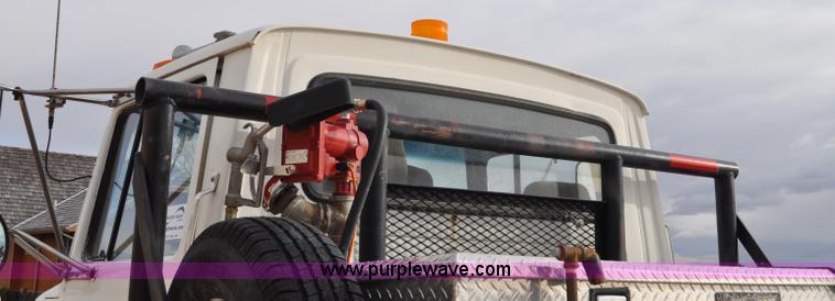 image for item G6371 1987 Ford LN8000 flatbed truck