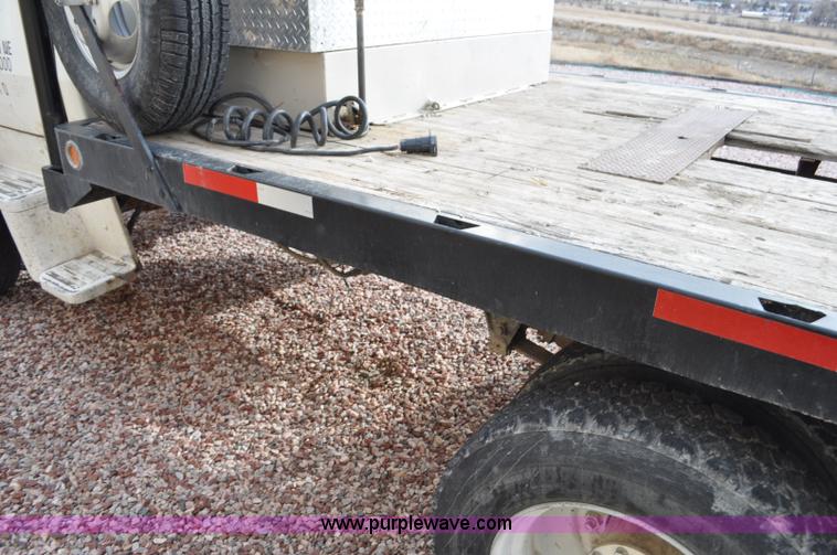 image for item G6371 1987 Ford LN8000 flatbed truck