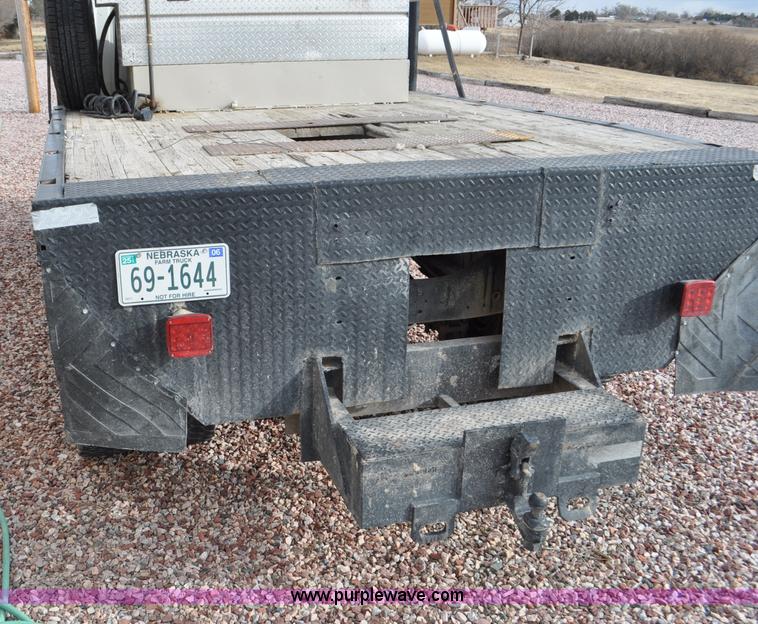 image for item G6371 1987 Ford LN8000 flatbed truck