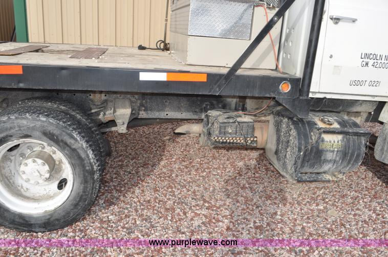 image for item G6371 1987 Ford LN8000 flatbed truck