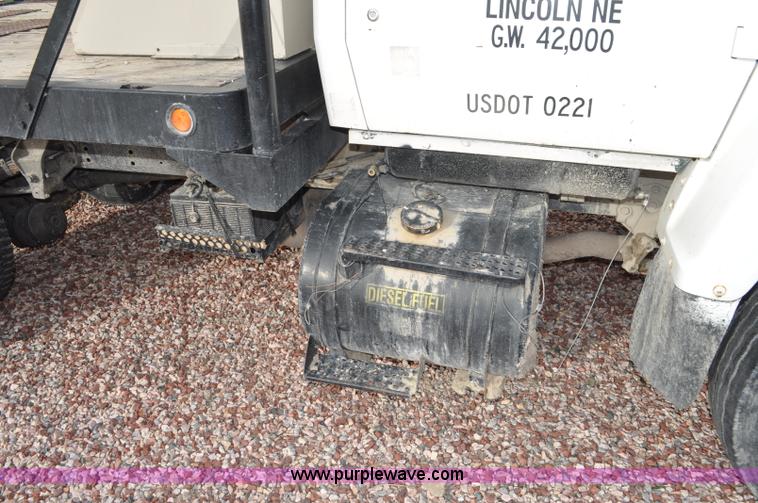 image for item G6371 1987 Ford LN8000 flatbed truck