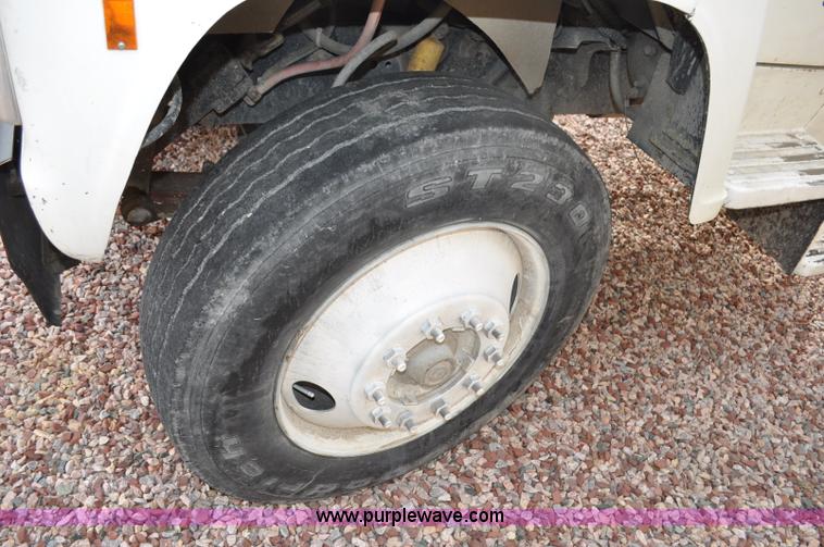 image for item G6371 1987 Ford LN8000 flatbed truck