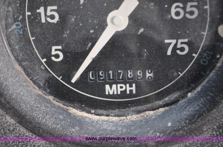 image for item G6371 1987 Ford LN8000 flatbed truck