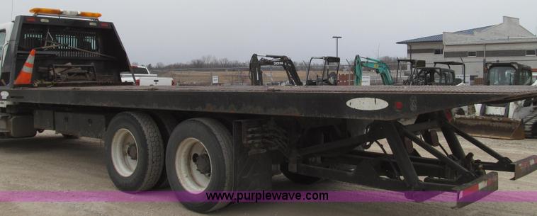 image for item G2253 2006 Freightliner Business Class M2 rollback truck