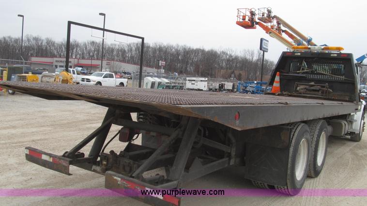 image for item G2253 2006 Freightliner Business Class M2 rollback truck