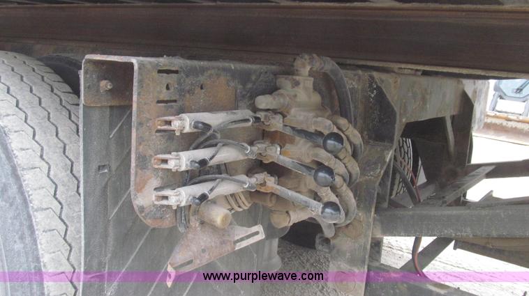 image for item G2253 2006 Freightliner Business Class M2 rollback truck