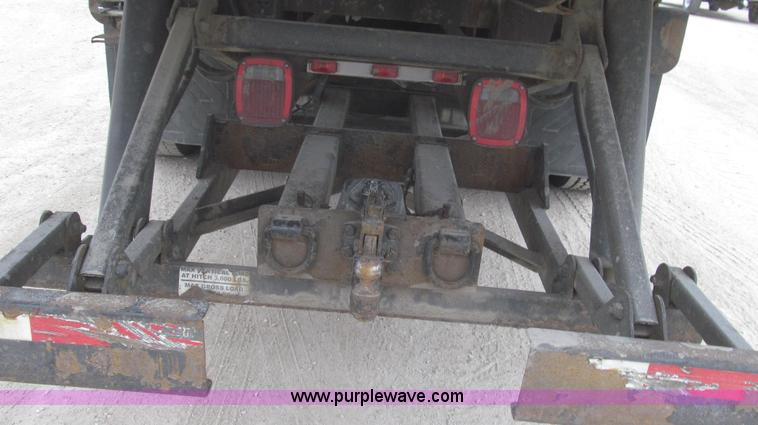 image for item G2253 2006 Freightliner Business Class M2 rollback truck