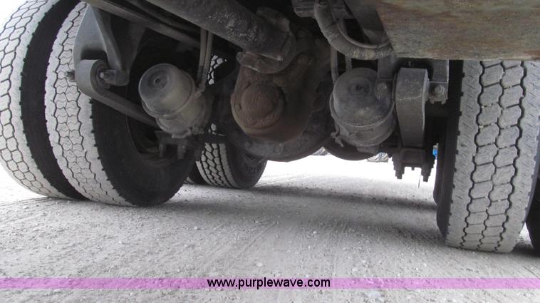 image for item G2253 2006 Freightliner Business Class M2 rollback truck