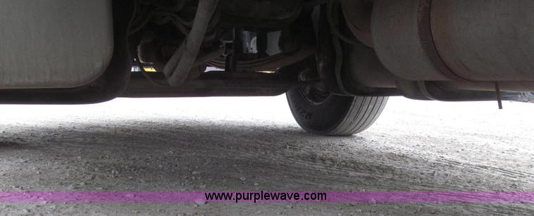 image for item G2253 2006 Freightliner Business Class M2 rollback truck