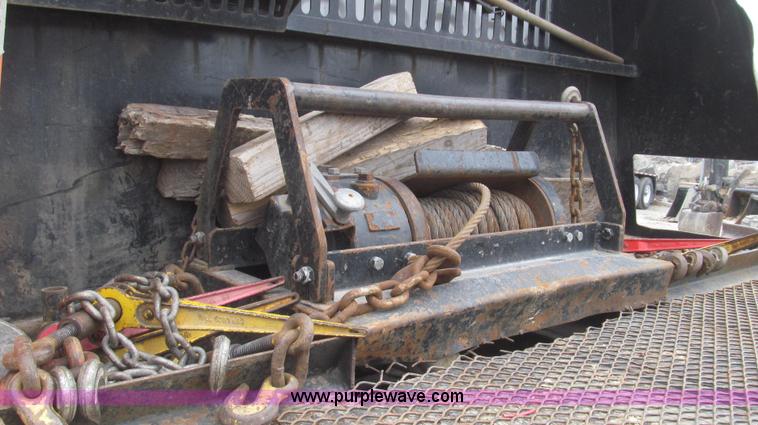 image for item G2253 2006 Freightliner Business Class M2 rollback truck