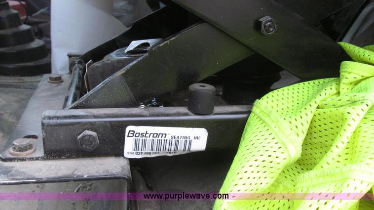 image for item G2253 2006 Freightliner Business Class M2 rollback truck