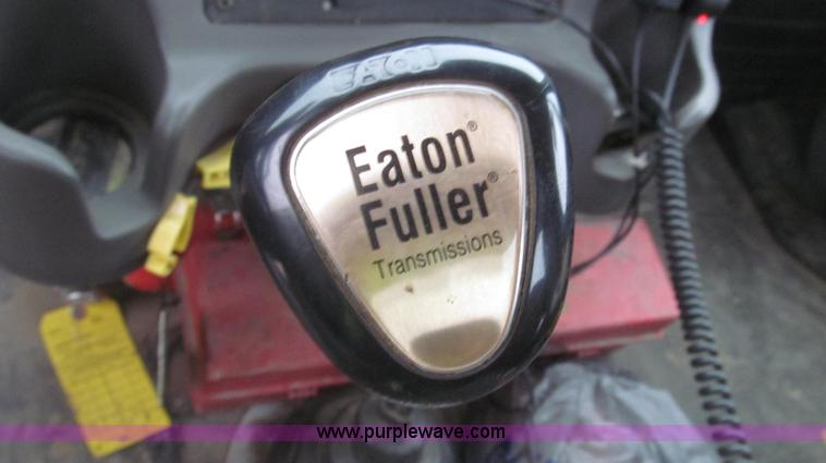 image for item G2253 2006 Freightliner Business Class M2 rollback truck