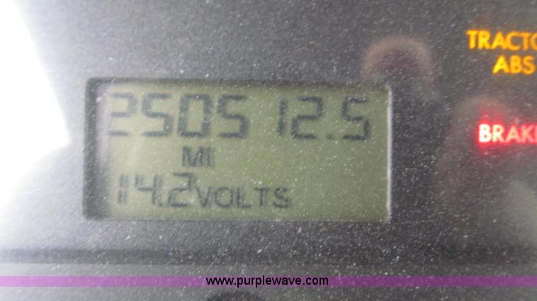 image for item G2253 2006 Freightliner Business Class M2 rollback truck