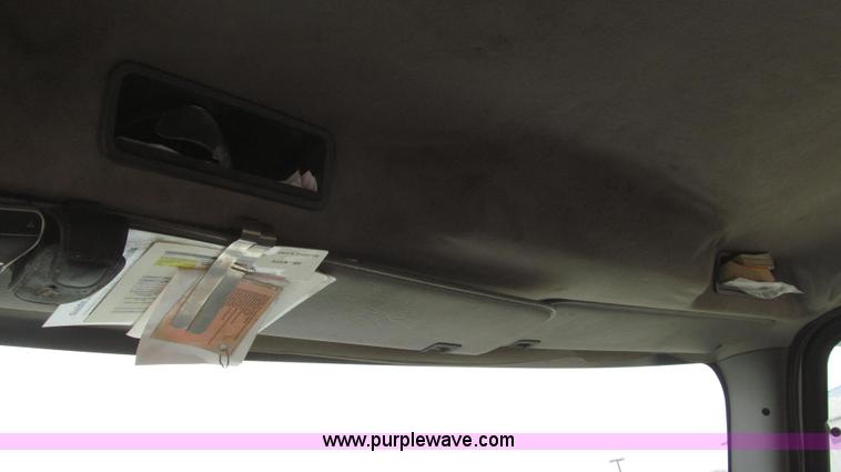 image for item G2253 2006 Freightliner Business Class M2 rollback truck