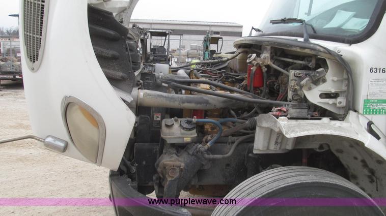 image for item G2253 2006 Freightliner Business Class M2 rollback truck