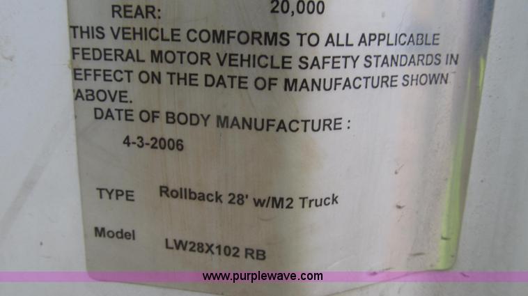 image for item G2253 2006 Freightliner Business Class M2 rollback truck