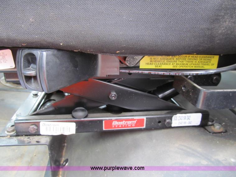 image for item G9554 2006 Freightliner Business Class M2 rollback truck