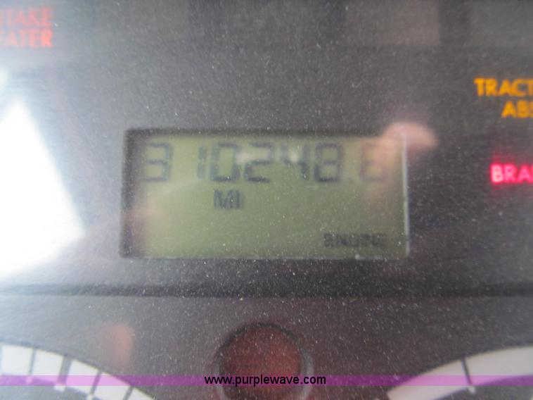 image for item G9554 2006 Freightliner Business Class M2 rollback truck