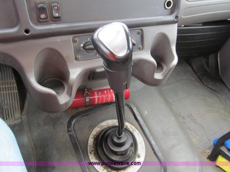 image for item G9554 2006 Freightliner Business Class M2 rollback truck