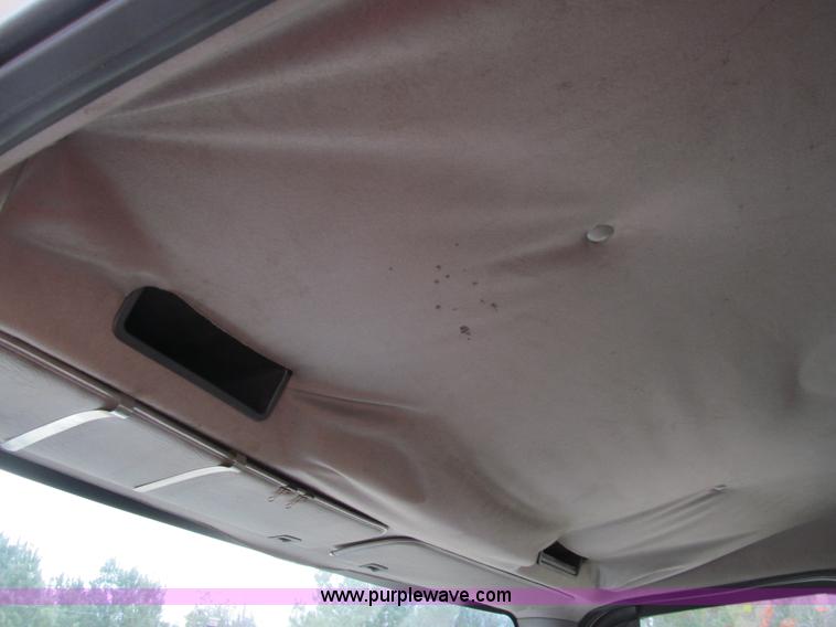 image for item G9554 2006 Freightliner Business Class M2 rollback truck