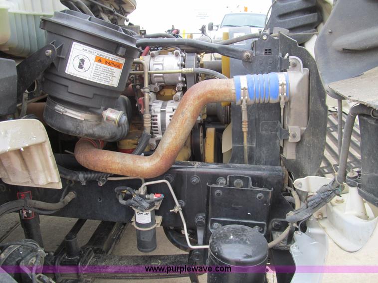 image for item G9554 2006 Freightliner Business Class M2 rollback truck