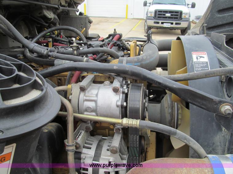 image for item G9554 2006 Freightliner Business Class M2 rollback truck