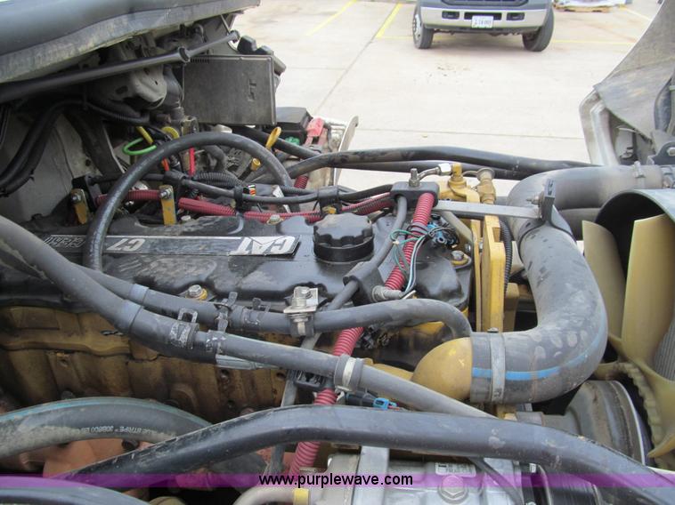 image for item G9554 2006 Freightliner Business Class M2 rollback truck