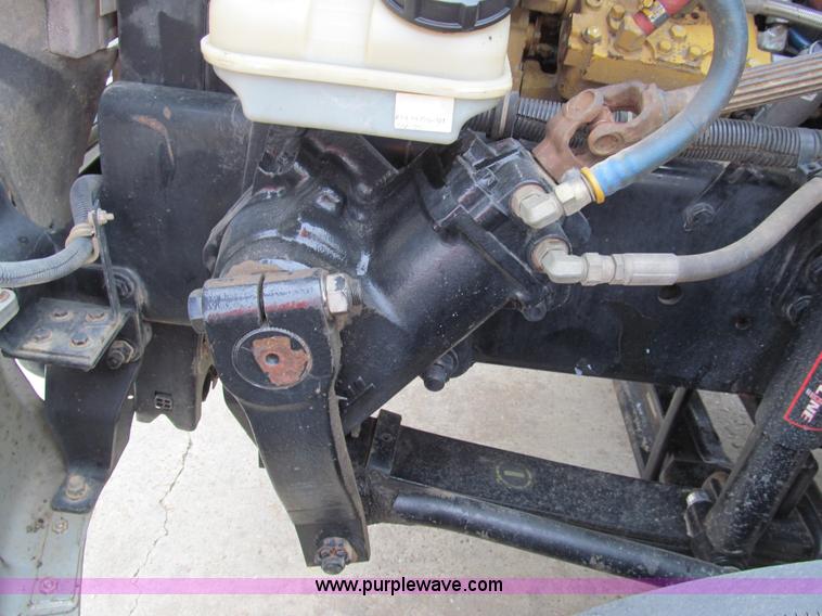 image for item G9554 2006 Freightliner Business Class M2 rollback truck