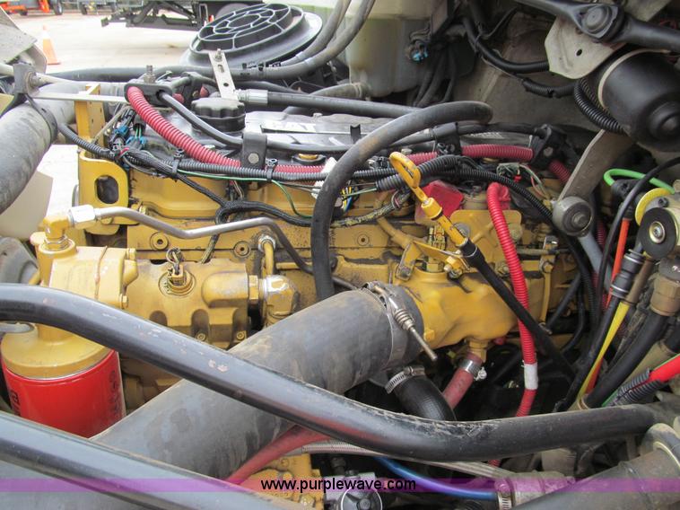 image for item G9554 2006 Freightliner Business Class M2 rollback truck