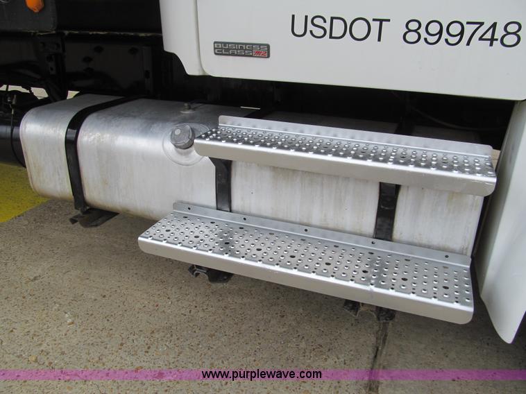 image for item G9554 2006 Freightliner Business Class M2 rollback truck