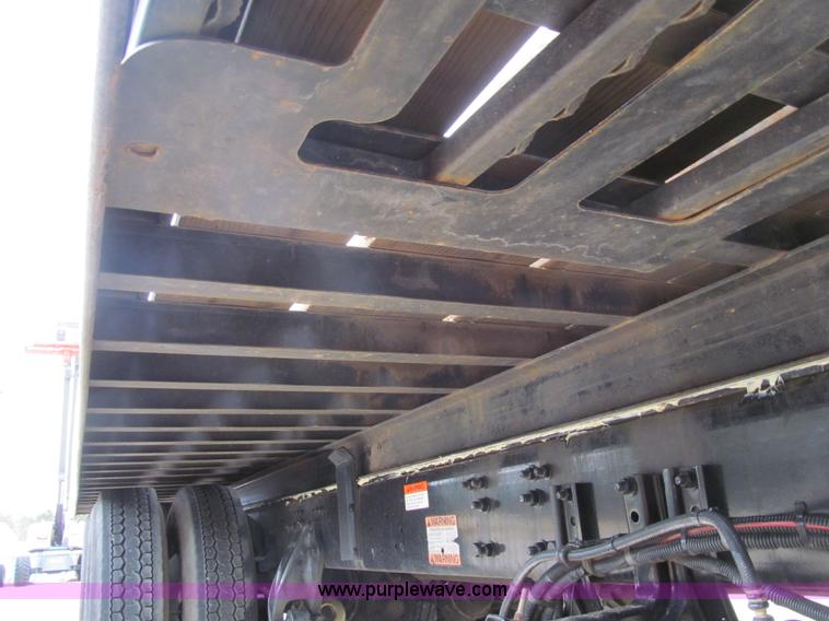 image for item G9554 2006 Freightliner Business Class M2 rollback truck