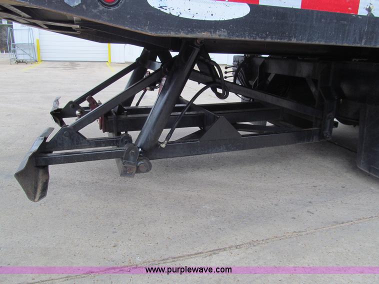 image for item G9554 2006 Freightliner Business Class M2 rollback truck