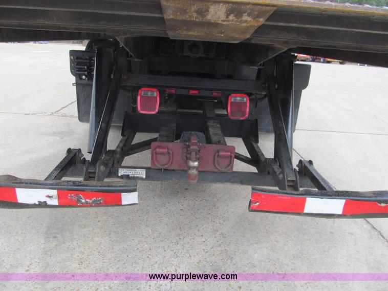 image for item G9554 2006 Freightliner Business Class M2 rollback truck