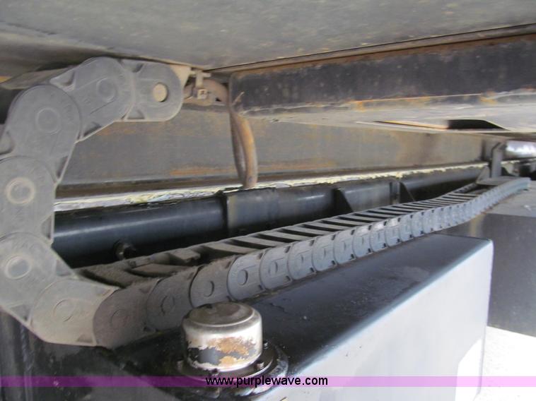 image for item G9554 2006 Freightliner Business Class M2 rollback truck