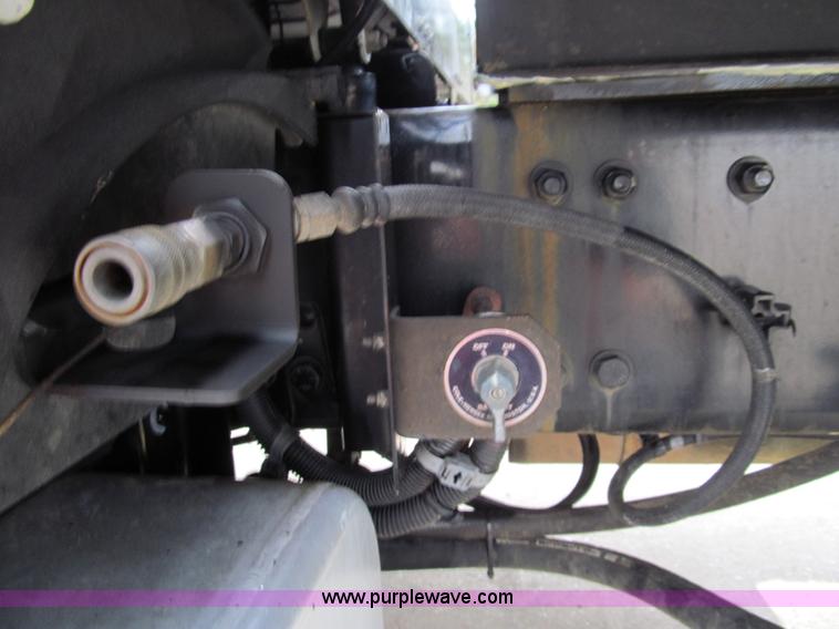 image for item G9554 2006 Freightliner Business Class M2 rollback truck