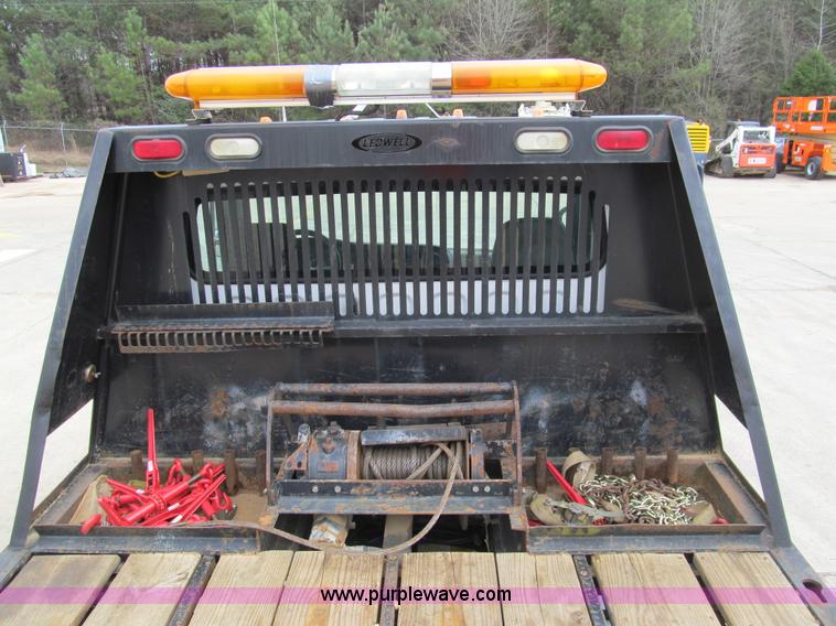 image for item G9554 2006 Freightliner Business Class M2 rollback truck