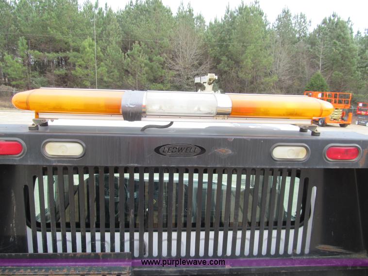 image for item G9554 2006 Freightliner Business Class M2 rollback truck