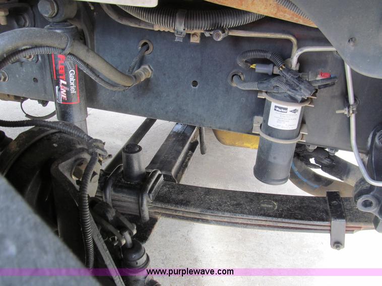 image for item G9554 2006 Freightliner Business Class M2 rollback truck