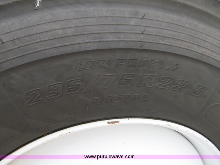 image for item G9554 2006 Freightliner Business Class M2 rollback truck