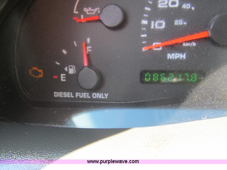 image for item G9566 2004 Ford F450 Super Duty flatbed truck