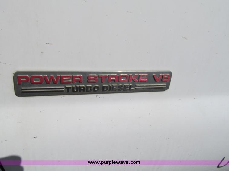 image for item G9566 2004 Ford F450 Super Duty flatbed truck