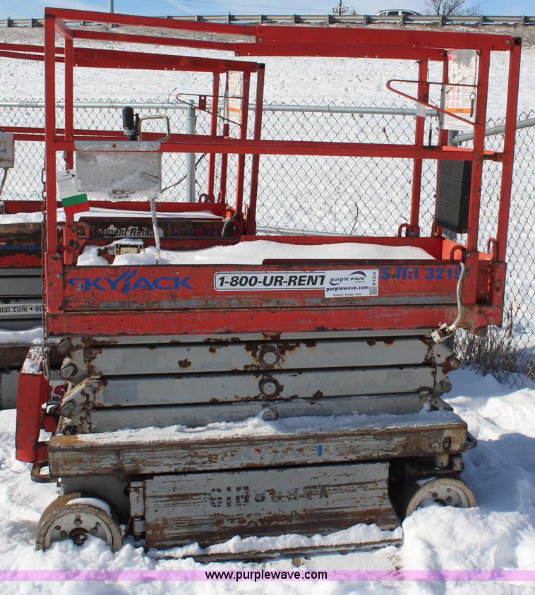 image for item H1339 2006 Skyjack SJ111 3219 electric scissor lift