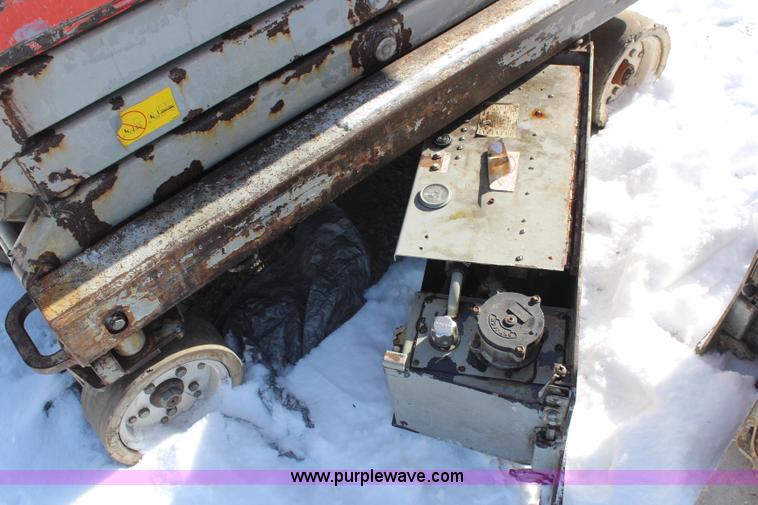 image for item H1339 2006 Skyjack SJ111 3219 electric scissor lift