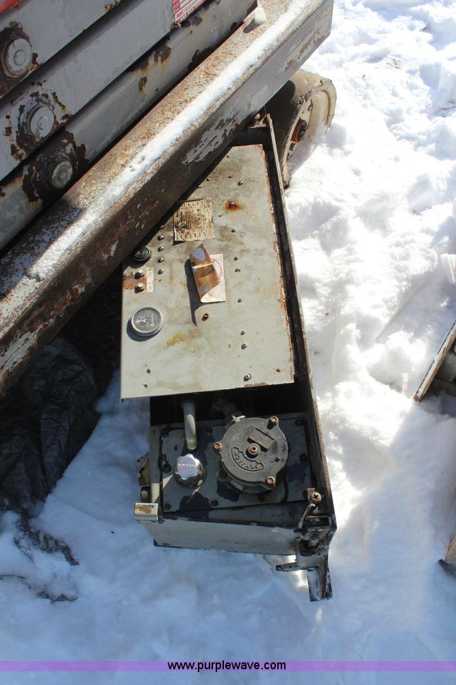 image for item H1339 2006 Skyjack SJ111 3219 electric scissor lift