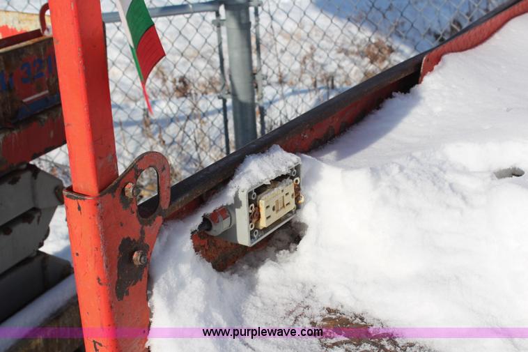 image for item H1339 2006 Skyjack SJ111 3219 electric scissor lift