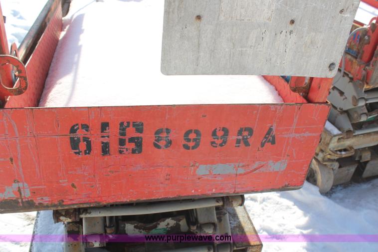 image for item H1339 2006 Skyjack SJ111 3219 electric scissor lift