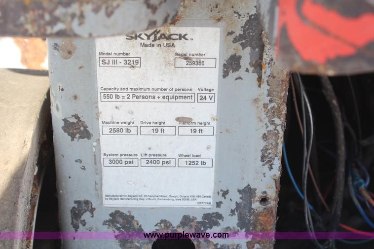 image for item H1340 2006 Skyjack SJ111 3219 electric scissor lift