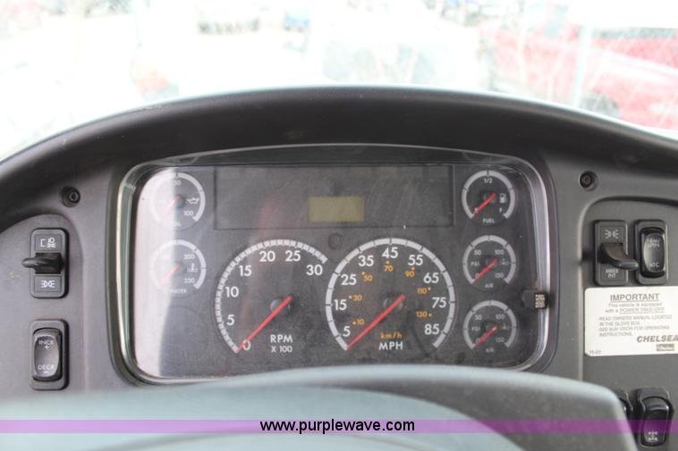 image for item H1377 2007 Freightliner Business Class M2 rollback truck