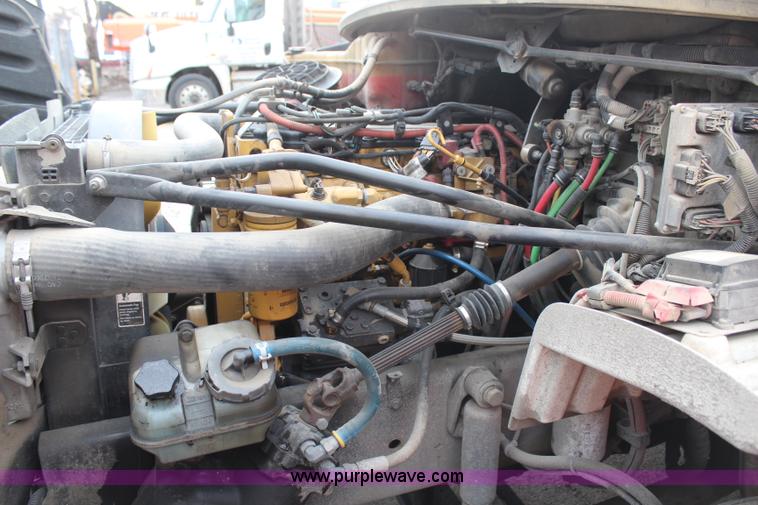 image for item H1377 2007 Freightliner Business Class M2 rollback truck