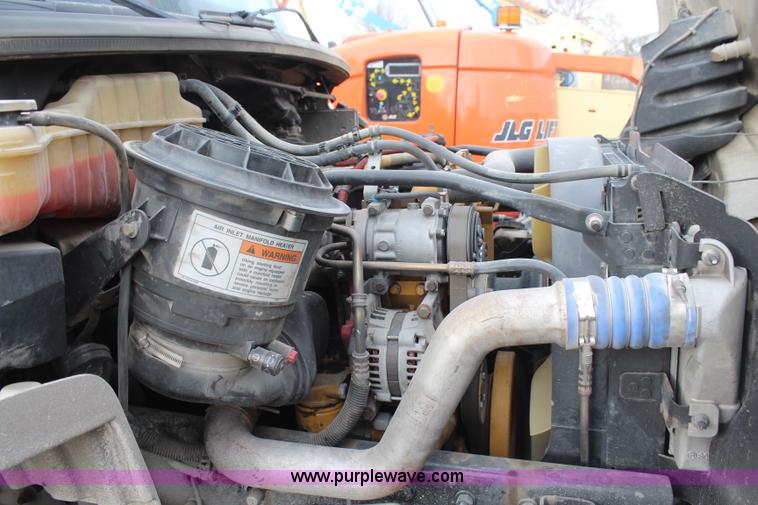 image for item H1377 2007 Freightliner Business Class M2 rollback truck